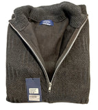 Folded gray fleece jacket with a brand tag on a white surface