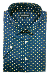 Folded teal shirt with yellow pattern on a white background