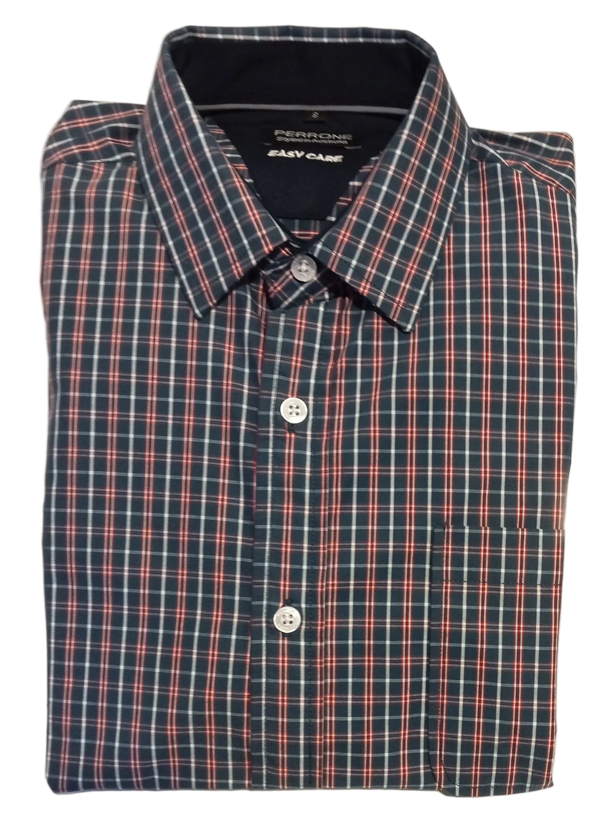 Folded plaid shirt on a white surface with a blurred background