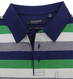 Folded striped polo shirt with visible brand label on a white background