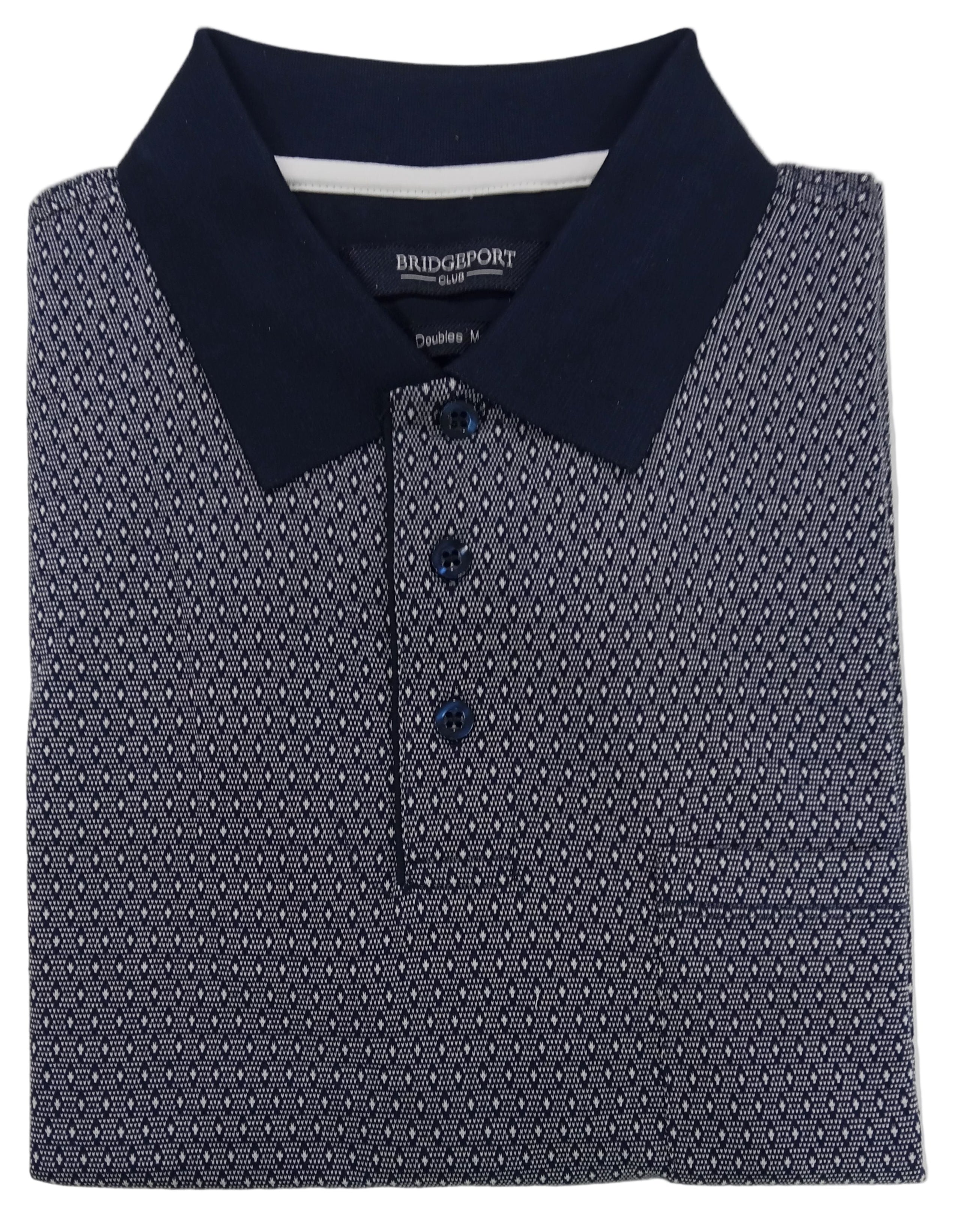 Folded navy polo shirt with white pattern on a light gray background