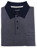 Folded navy polo shirt with white pattern on a light gray background