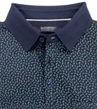 Folded navy polo shirt with a subtle pattern on a gray background