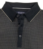 Folded black and white patterned polo shirt with 'Bridgestone' branding on a gray background