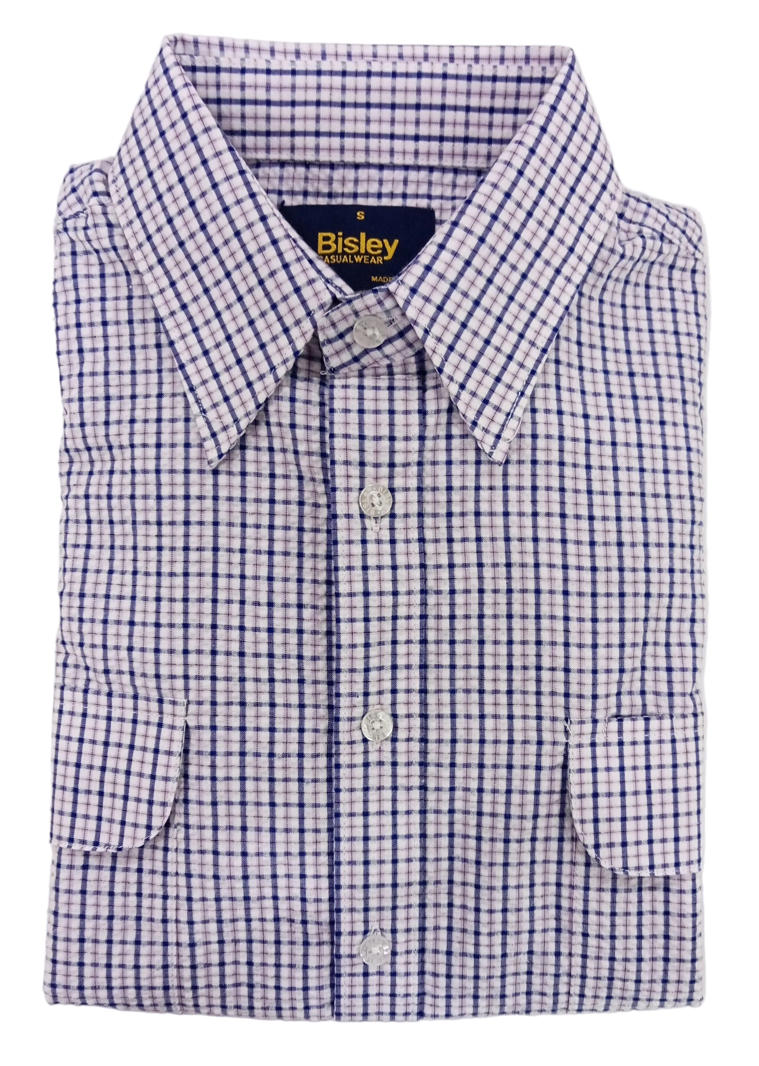 Folded checkered shirt with Bisley branding on a white background