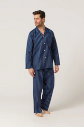 Man wearing a blue striped pajama set on a white background