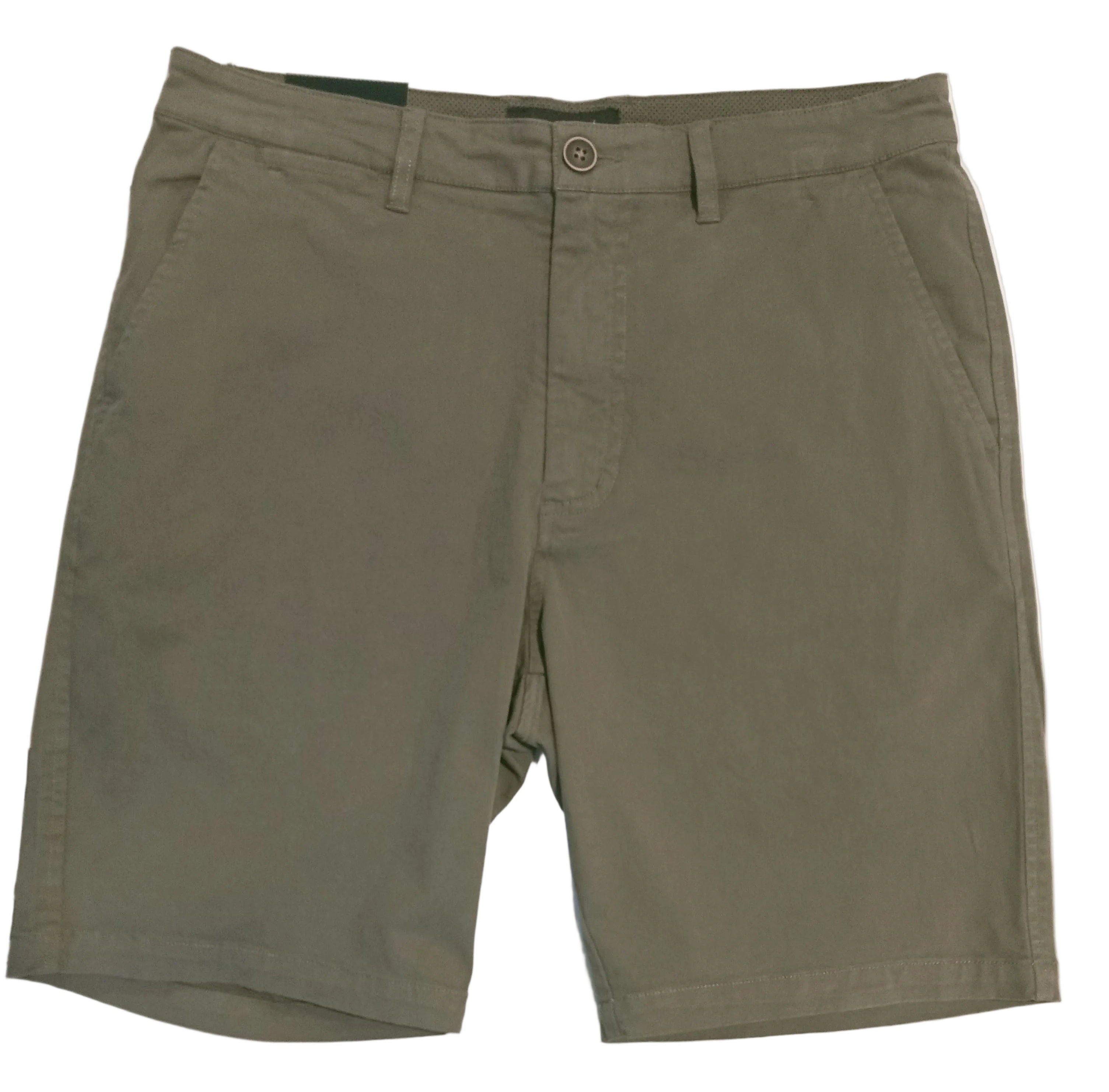 A pair of olive green chino shorts laid flat on a white surface, with a person's legs visible below the frame.