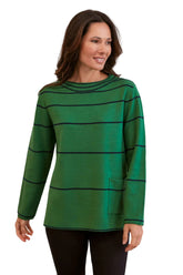 A woman wearing a navy green striped jumper with long sleeves.