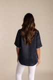 Women's navy blue elbow-sleeve top with a relaxed fit
