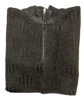 Folded gray sweater with a zipper on a white surface