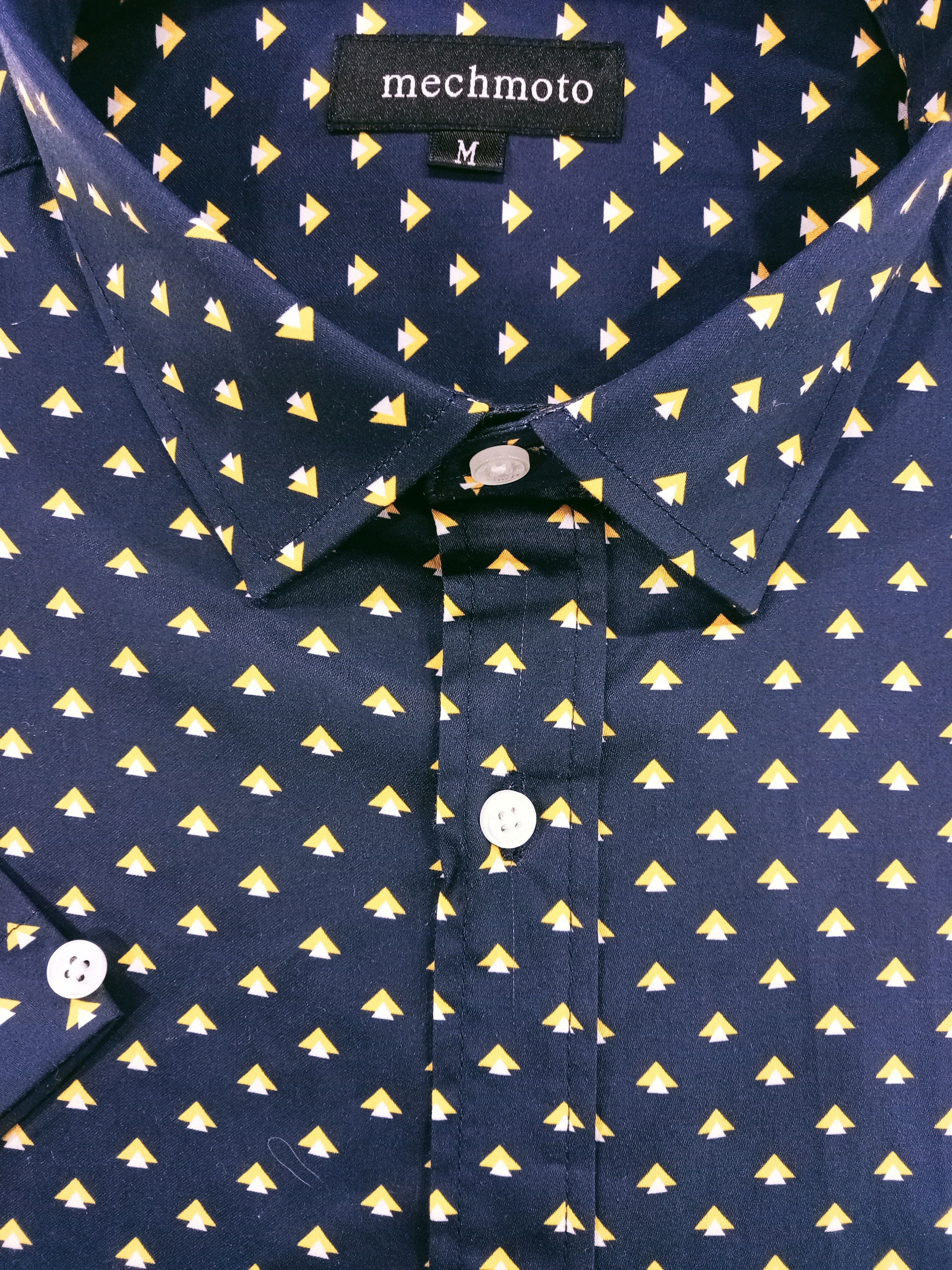 Navy shirt with yellow geometric pattern and 'Mechmoto' label