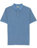 Blue polo shirt on a white background