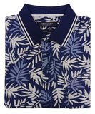 Navy blue polo shirt with white leaf pattern on a light gray background
