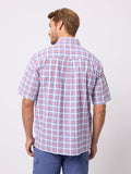 Man wearing a plaid short-sleeve shirt on a white background