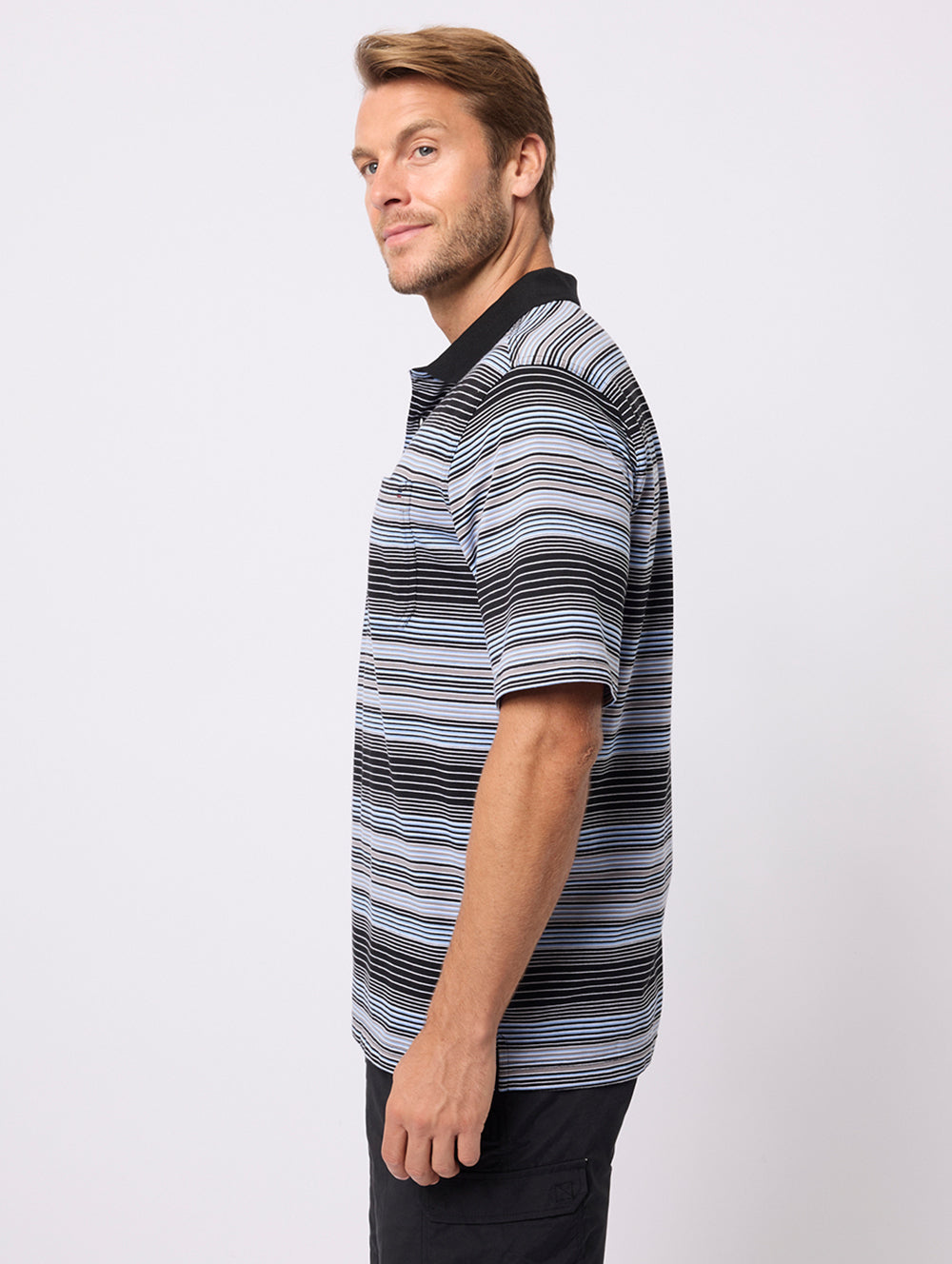 Man wearing a black and gray striped polo shirt on a white background