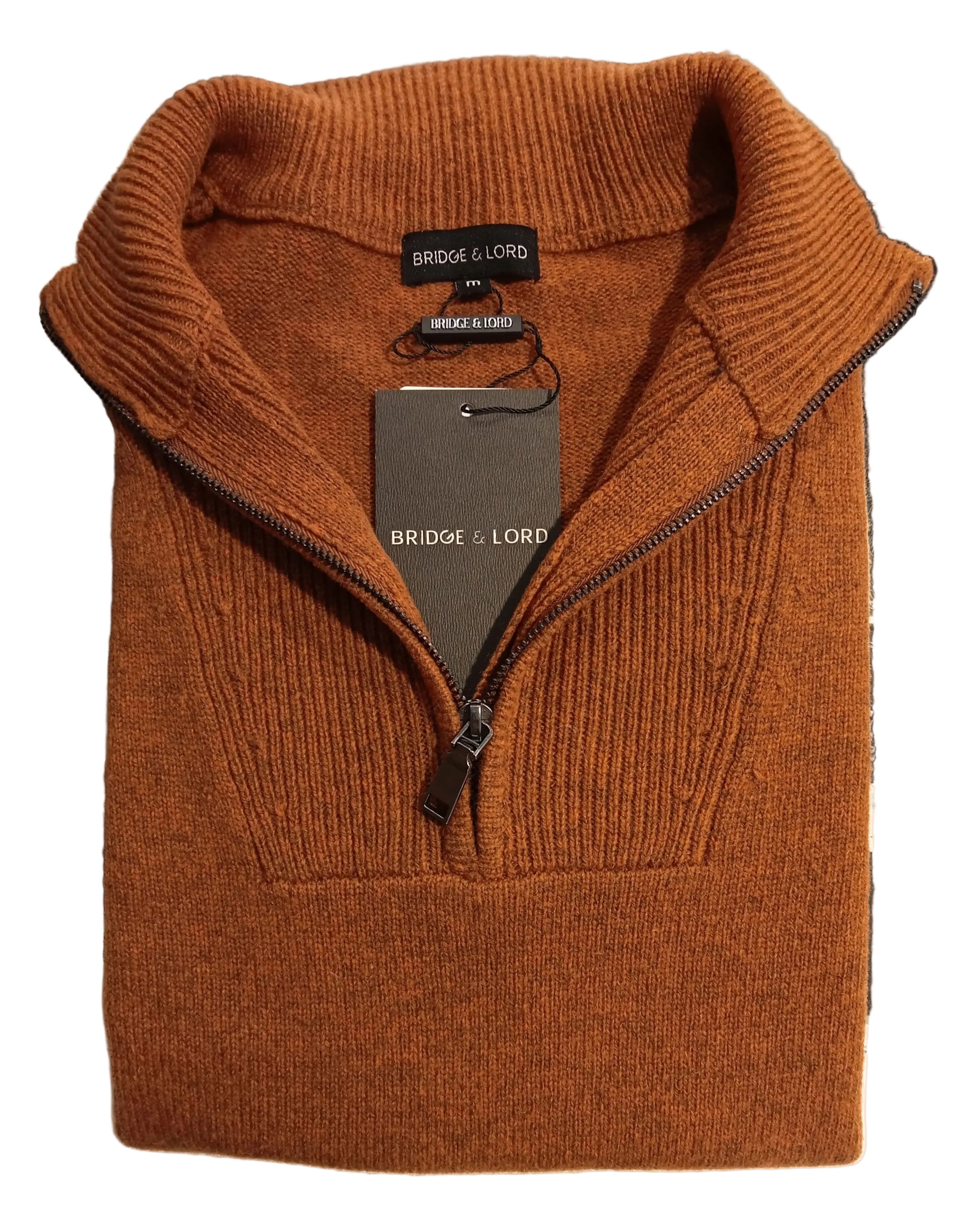 Brown sweater with a tag on a white background