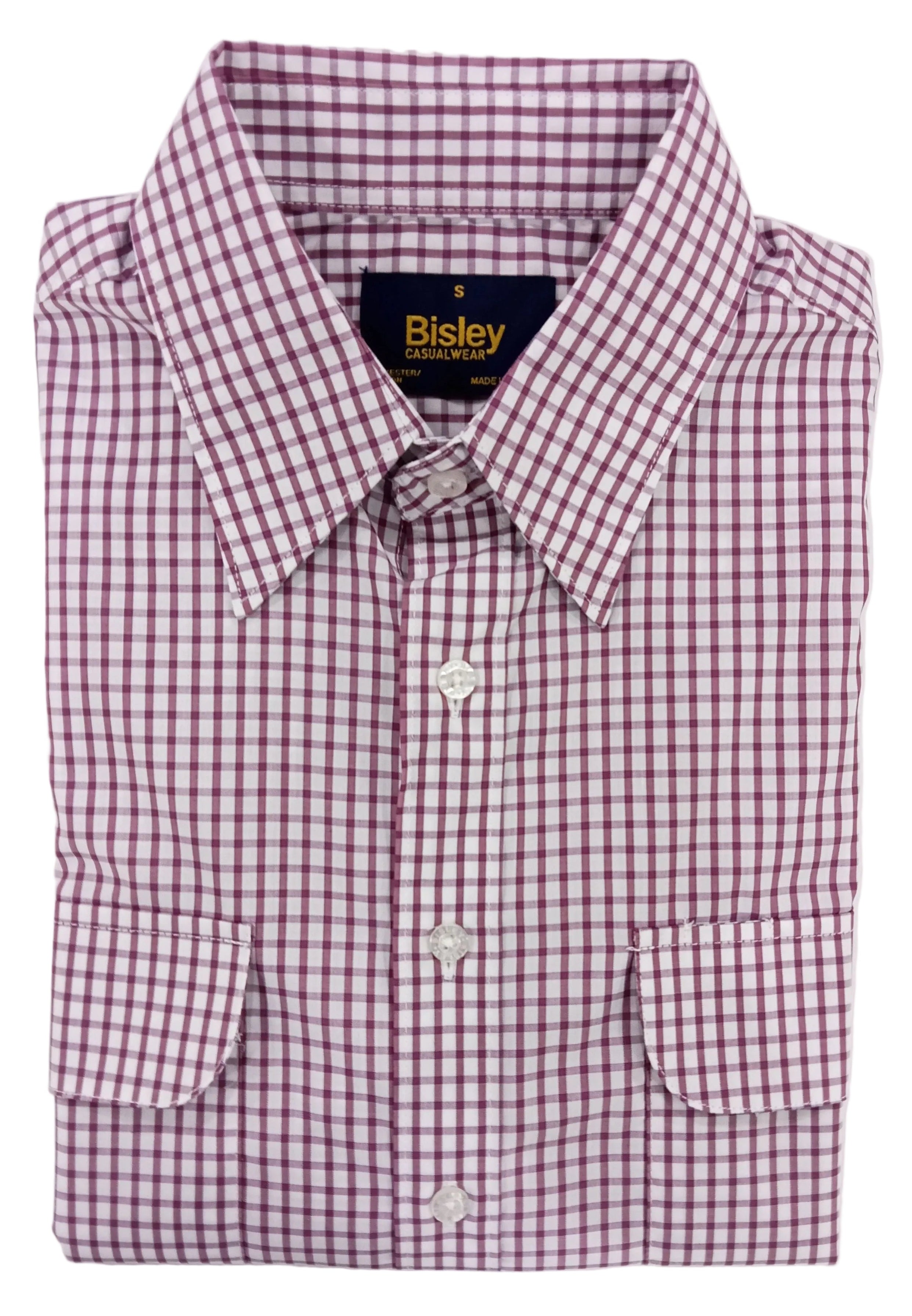 Folded checkered shirt with 'Bisley' branding on a white background
