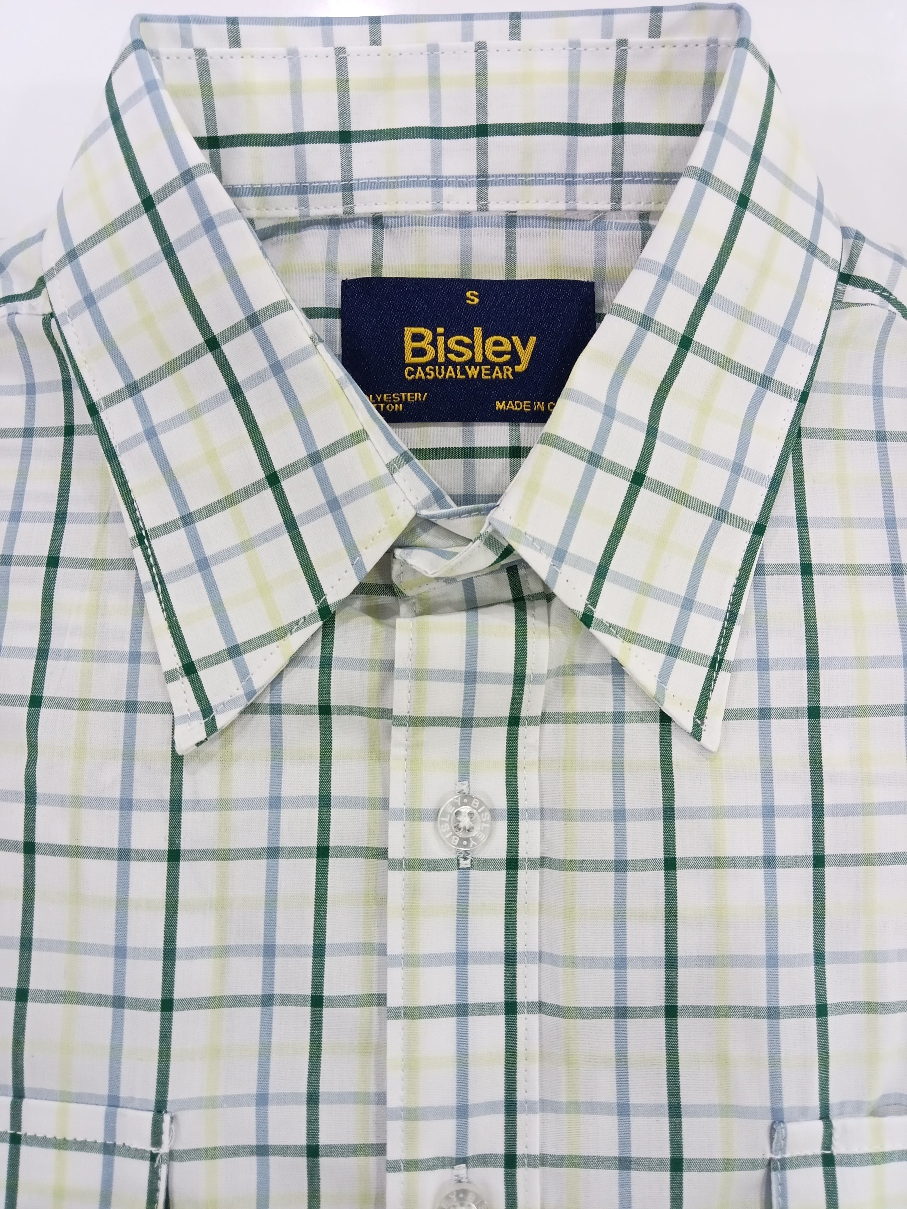 Green and white checkered shirt with Bisley label on a white background