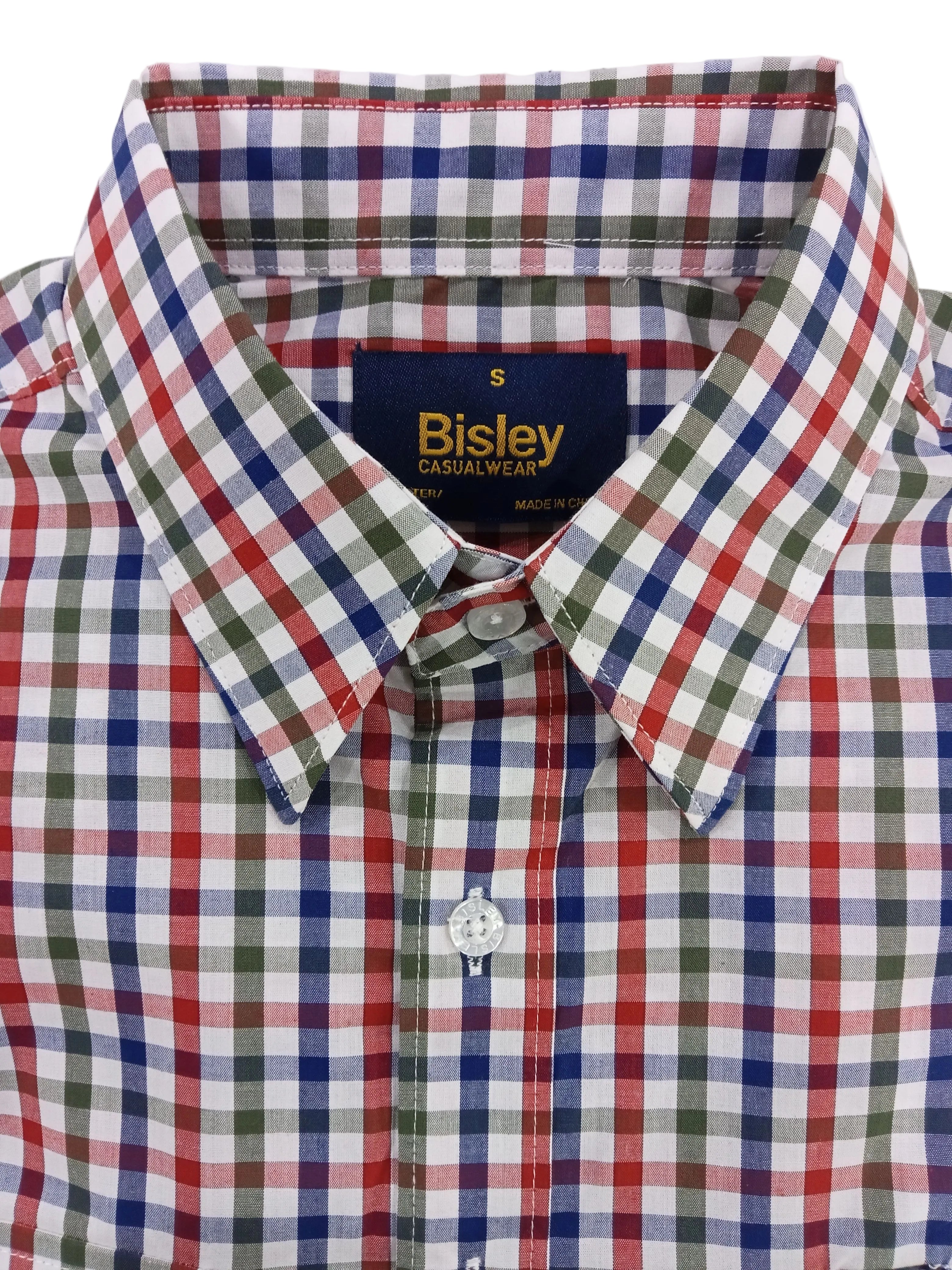 Folded checkered shirt with Bisley branding on a white background