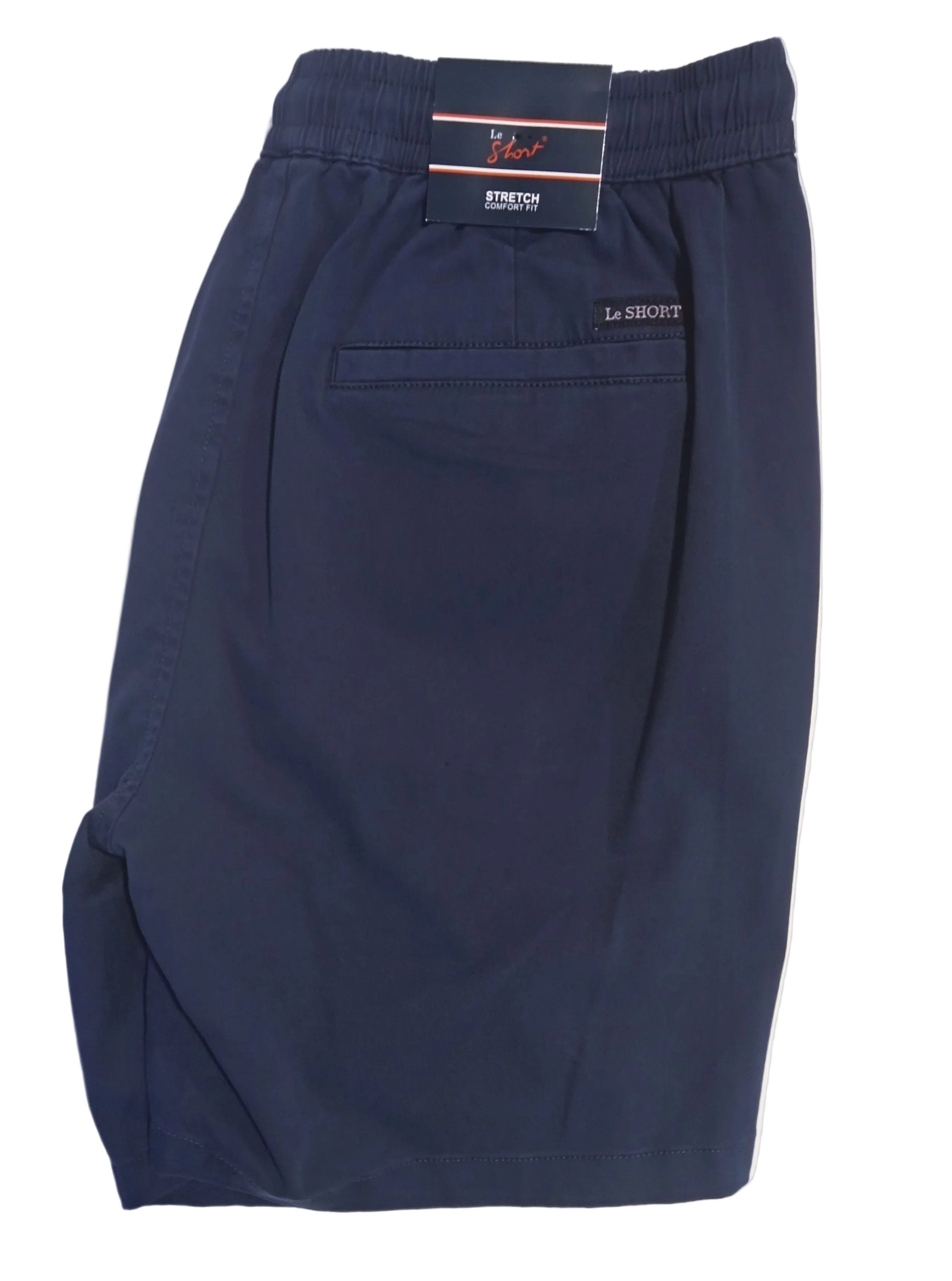 A pair of dark navy blue shorts with an elastic waistband, laid flat on a white surface. The brand name 'LE SHORT' is visible on both the inner waistband label and embroidered on the side pocket.