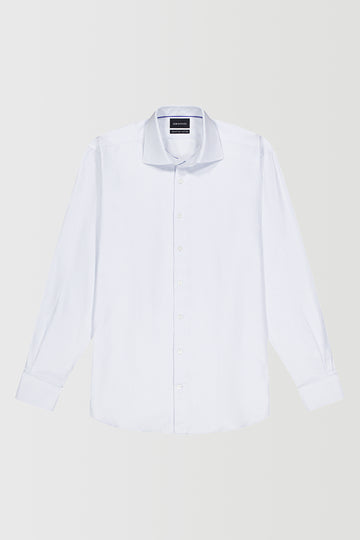 White dress shirt on a light beige background