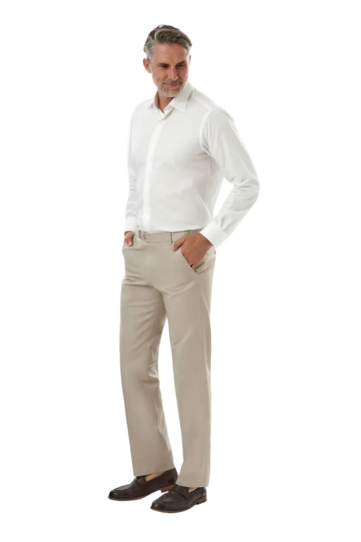 Man wearing a white shirt and beige pants on a white background