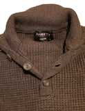 Brown textured sweater with button details on a white surface