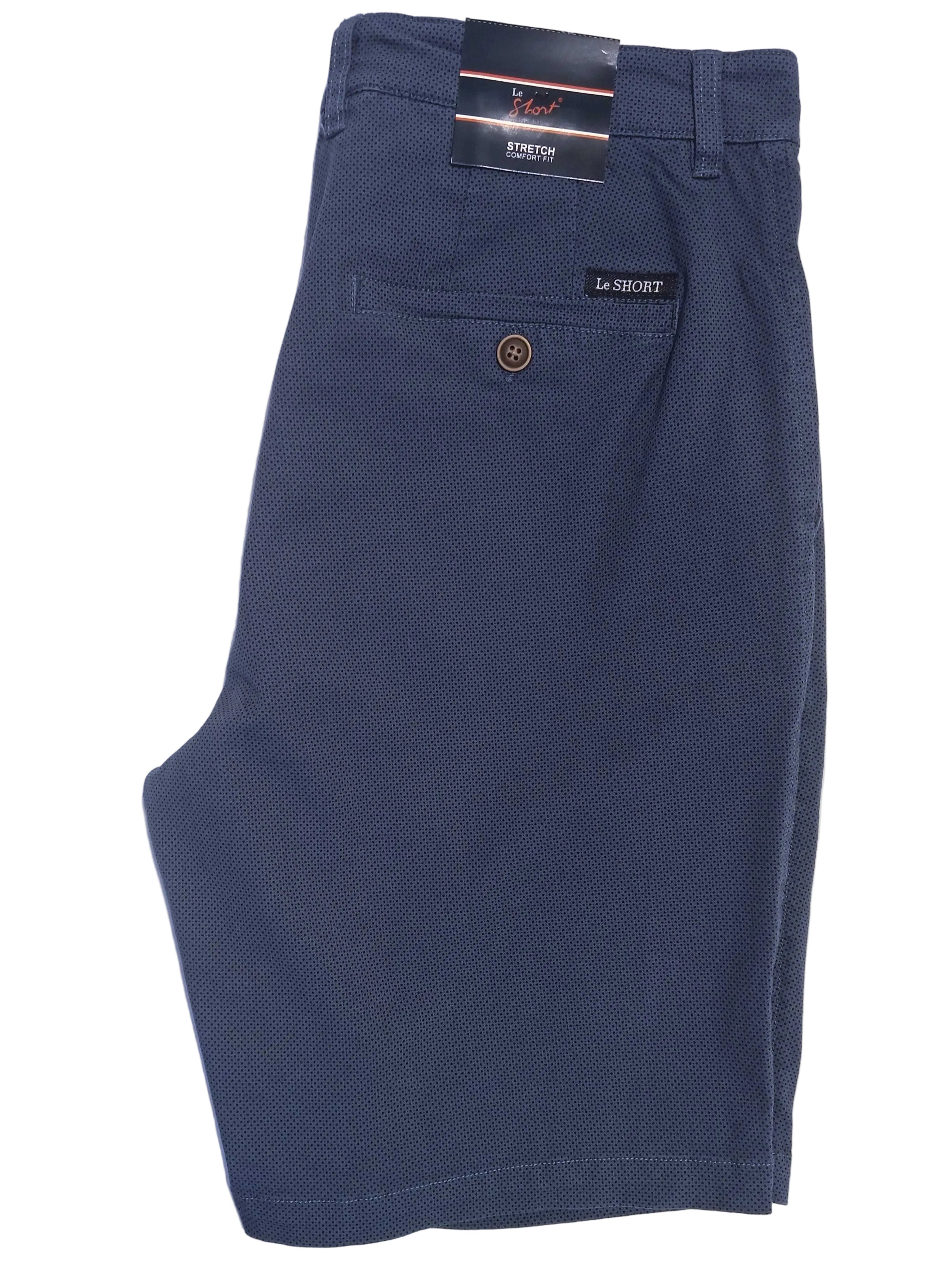 A pair of dark navy blue shorts with a textured pique knit fabric, featuring a back pocket with a button closure and a visible 'Vest' brand tag.