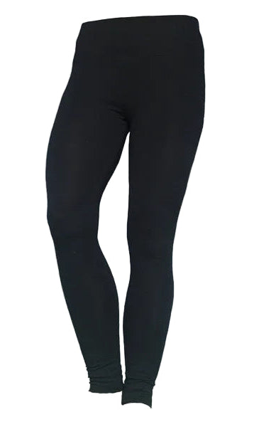 Black full-length leggings on a textured beige background with 'bt' branding.