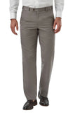 Person wearing gray dress pants with a white shirt on a light gray background