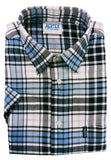 Folded plaid shirt with brand label on a white background