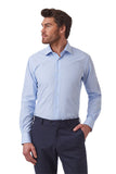 A man wearing a light blue long-sleeve dress shirt and dark navy trousers, standing against a plain white background.