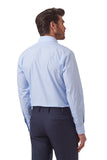 A man shown from the back wearing a light blue long-sleeve dress shirt and dark navy trousers, photographed against a plain white studio background.