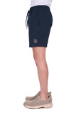 Navy shorts worn by a person on a white background