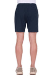Navy blue shorts worn by a person on a white background