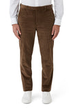 Brown corduroy pants worn by a person on a white background