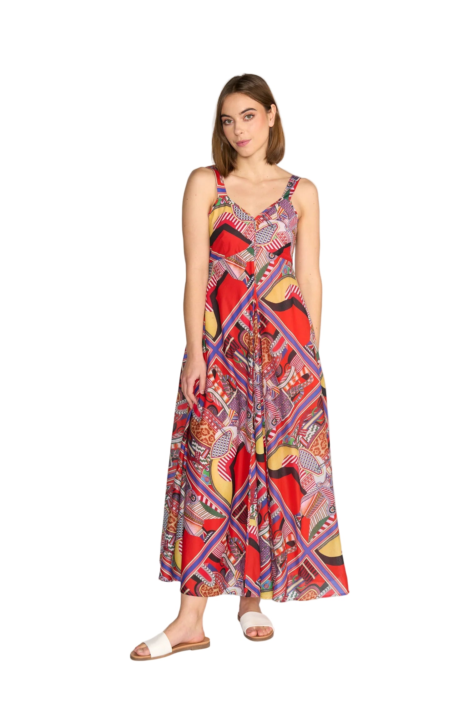 Woman wearing a colorful patterned dress on a white background