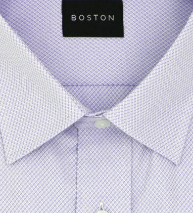 Folded light purple dress shirt with white collar and cuffs on a white background