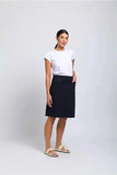 Person wearing a white t-shirt and black skirt on a white background